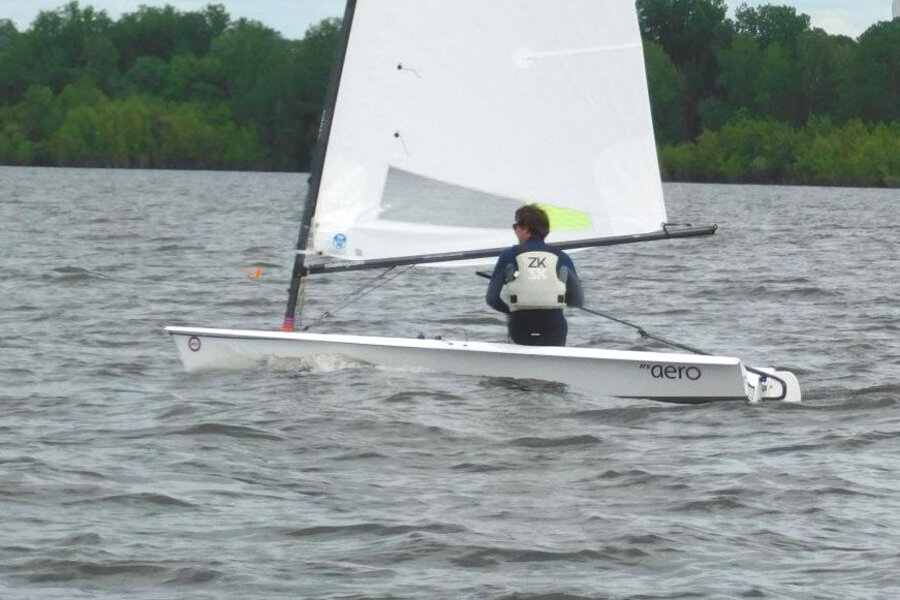 A sailor racing an RS Aero dinghy